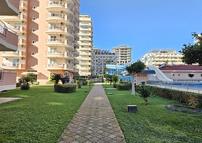 Просторная квартира 2+1 в районе Махмутлар на первой линии