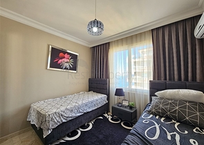 Просторная квартира 2+1 в районе Махмутлар на первой линии