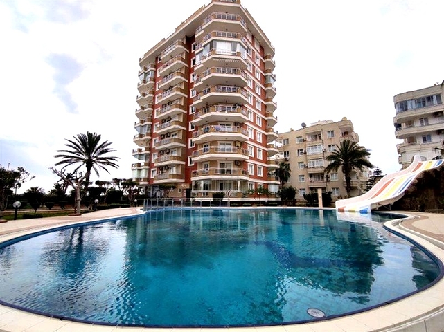 Просторная квартира 2+1 в районе Махмутлар в 50 метрах от моря