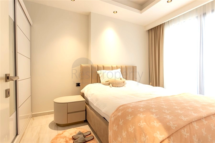 Уютная квартира 1+1 в районе Махмутлар в 50 метрах от моря