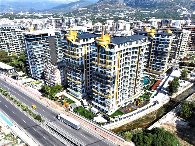 Уютная квартира 1+1 в районе Махмутлар в 50 метрах от моря