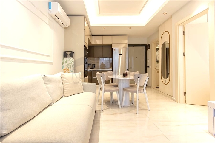 Уютная квартира 1+1 в районе Махмутлар в 50 метрах от моря