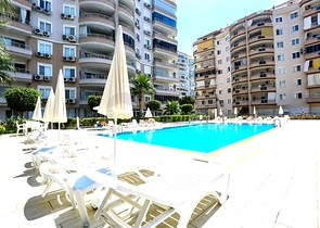 Просторная 2+1 в Махмутларе рядом с центром и морем