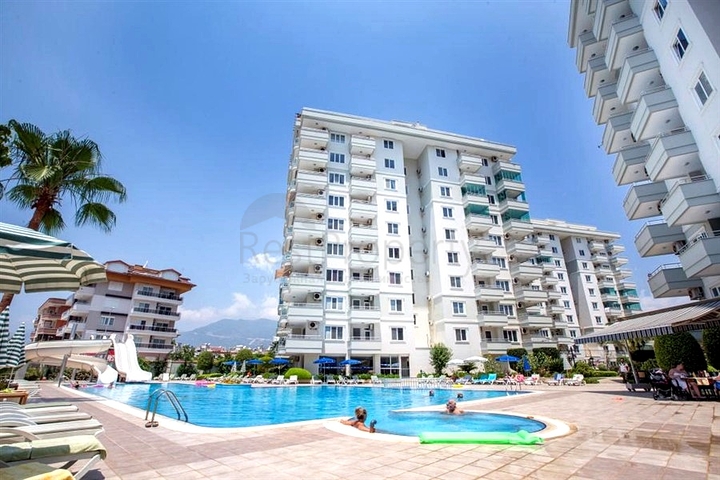 Двухуровневая квартира 4+1 с террасой в районе Тосмур