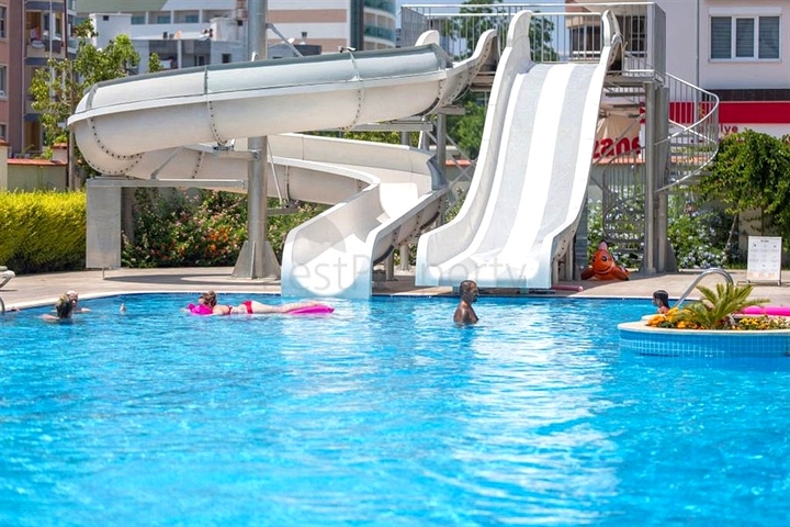 Двухуровневая квартира 4+1 с террасой в районе Тосмур