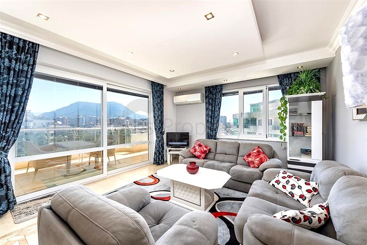 Двухуровневая квартира 4+1 с террасой в районе Тосмур