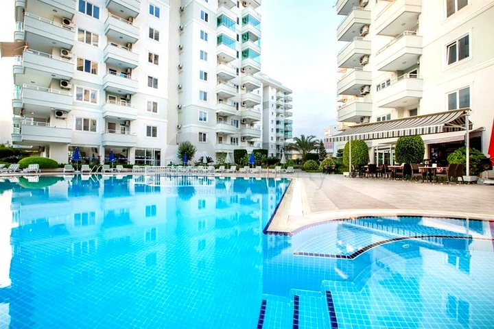 Двухуровневая квартира 4+1 с террасой в районе Тосмур