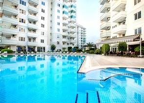 Двухуровневая квартира 4+1 с террасой в районе Тосмур