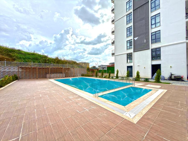 Уютная квартира 1+1 в районе Махмутлар в новом доме