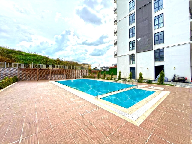 Современная квартира 2+1 в районе Махмутлар