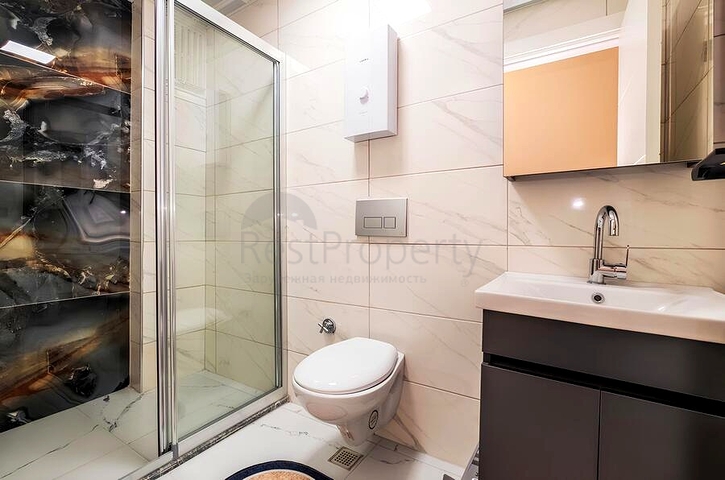 Современная квартира 2+1 в районе Махмутлар