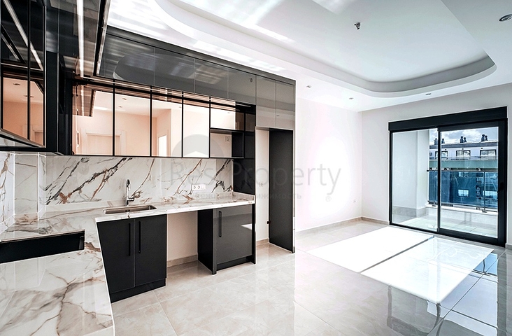 Современная квартира 1+1 в районе Махмутлар с инфраструктурой премиум-класса