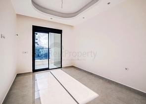 Современная квартира 1+1 в районе Махмутлар с инфраструктурой премиум-класса