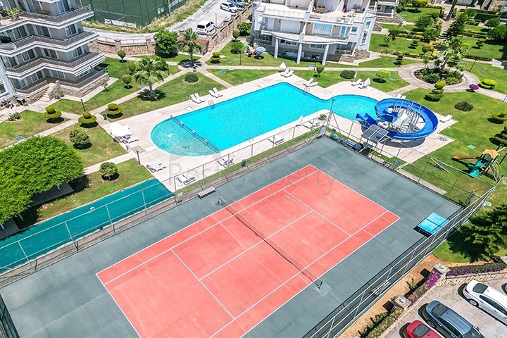 Просторная квартира 3+1 в районе Оба с террасой и развитой инфраструктурой