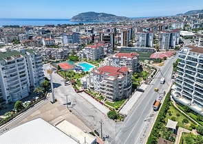 Просторная квартира 3+1 в районе Оба с террасой и развитой инфраструктурой