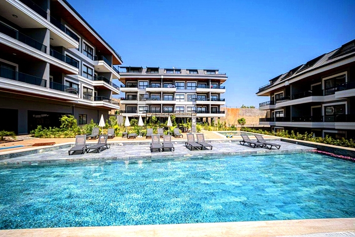 Современная квартира 1+1 в районе Конаклы в новом жилом комплексе