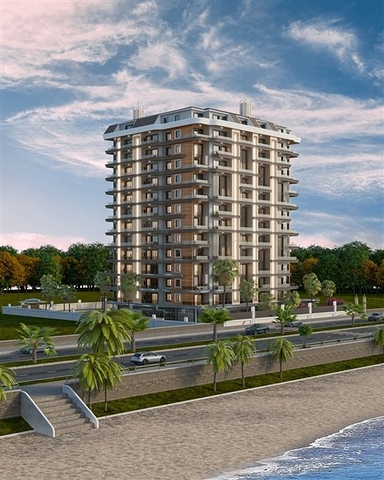 Современные квартиры в районе Махмутлар на первой береговой линии 