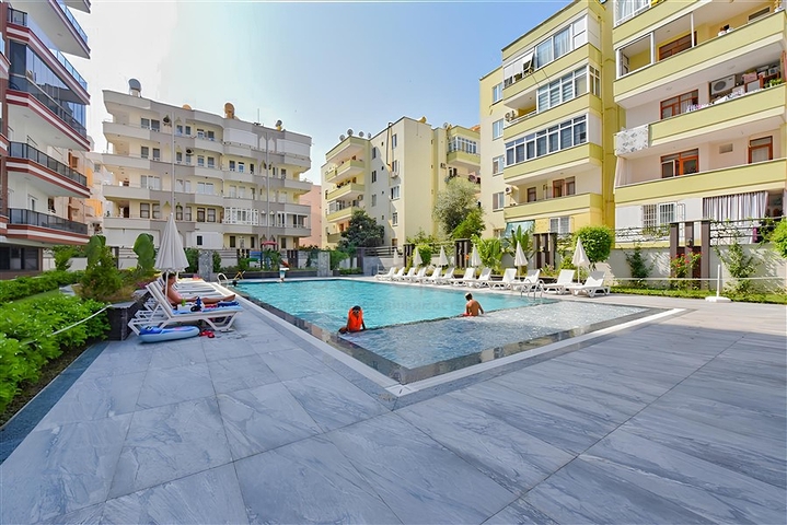 Квартира 2+1 в районе Махмутлар с отдельной кухней в современном комплексе 