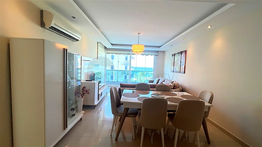 Меблированная квартира 2+1 в районе Тосмур в 50 метрах от моря 