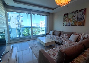 Меблированная квартира 2+1 в районе Тосмур в 50 метрах от моря 