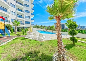 Современная квартира 1+1 в районе Махмутлар с развитой инфраструктурой комплекса