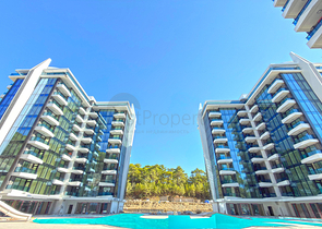 Современная квартира 1+1 в районе Авсаллар рядом с морем