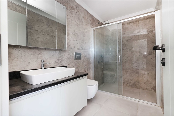 Двухуровневая квартира 4+1 с собственным садом в районе Каргыджак