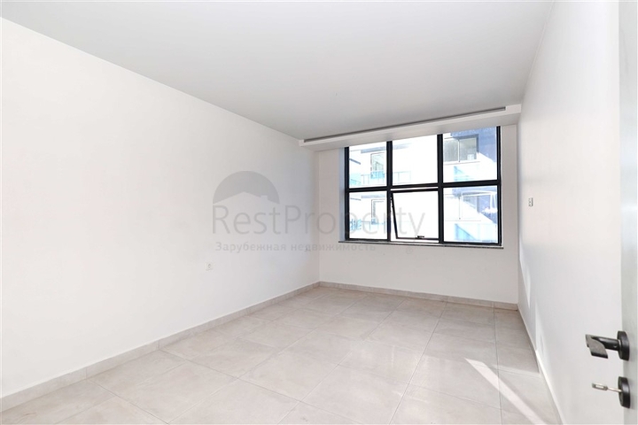 Двухуровневая квартира 4+1 с собственным садом в районе Каргыджак