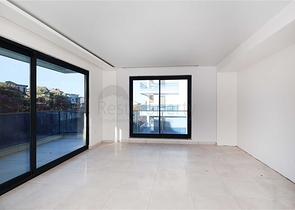 Двухуровневая квартира 4+1 с собственным садом в районе Каргыджак