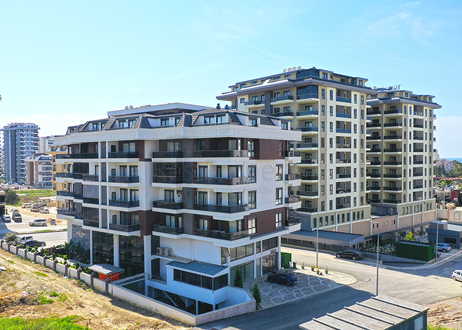 Пентхаус 2+1 в районе Махмутлар с террасой и удобным расположением