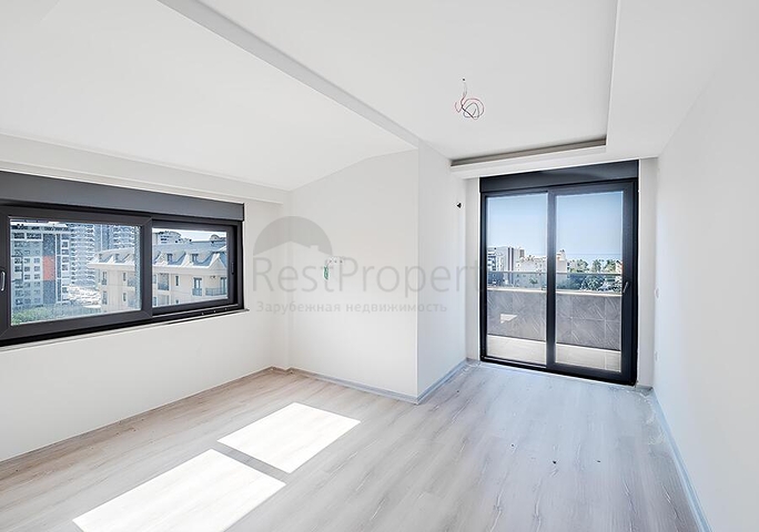 Пентхаус 2+1 в районе Махмутлар с террасой и удобным расположением