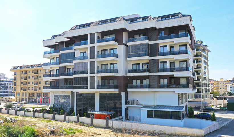 Пентхаус 2+1 в районе Махмутлар с террасой и удобным расположением