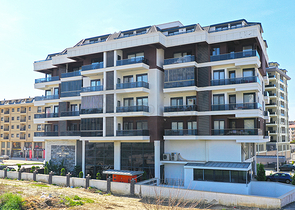 Пентхаус 2+1 в районе Махмутлар с террасой и удобным расположением