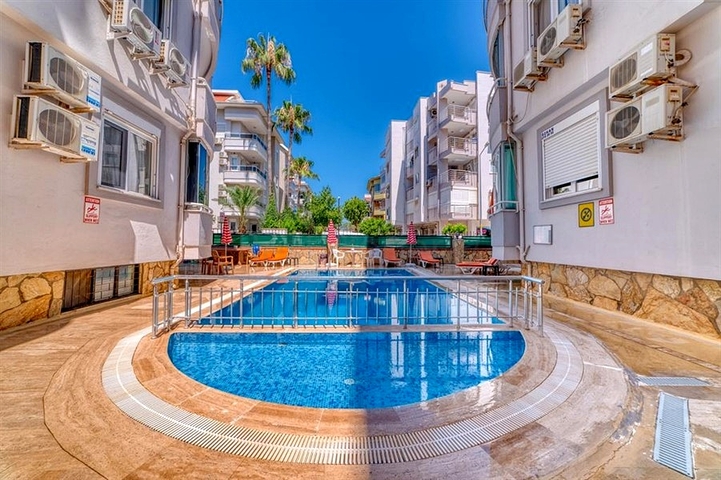 Уютная квартира с мебелью в жилом комплексе в центре города