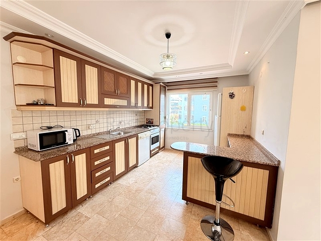 Уютная квартира с мебелью в жилом комплексе в центре города