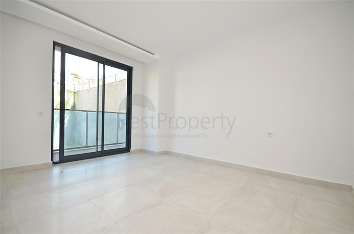 Просторная двухуровневая квартира с выходом в сад и продуманным зонированием