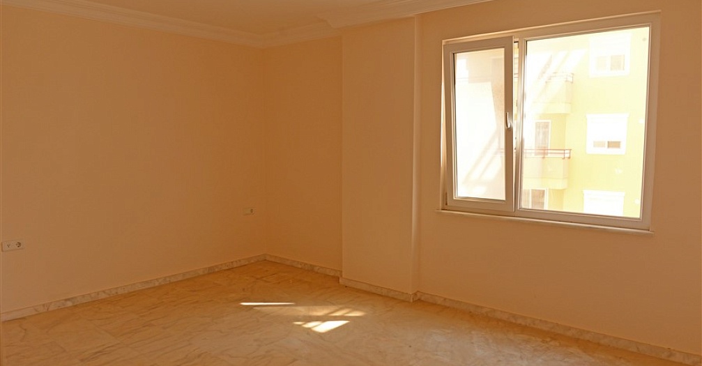 Просторная квартира с двумя спальными комнатами в Махмутларе - Фото 11
