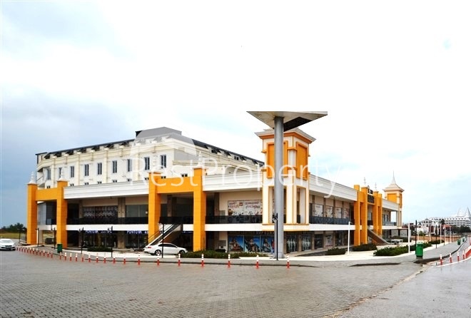 Коммерческие помещения в торговом центре в районе Окурджалар  - Фото 2