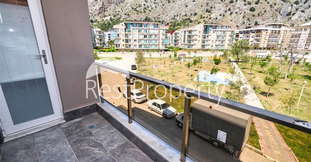 Квартира 1+1 с видом на торосские горы в районе Хурма Анталья - Фото 18